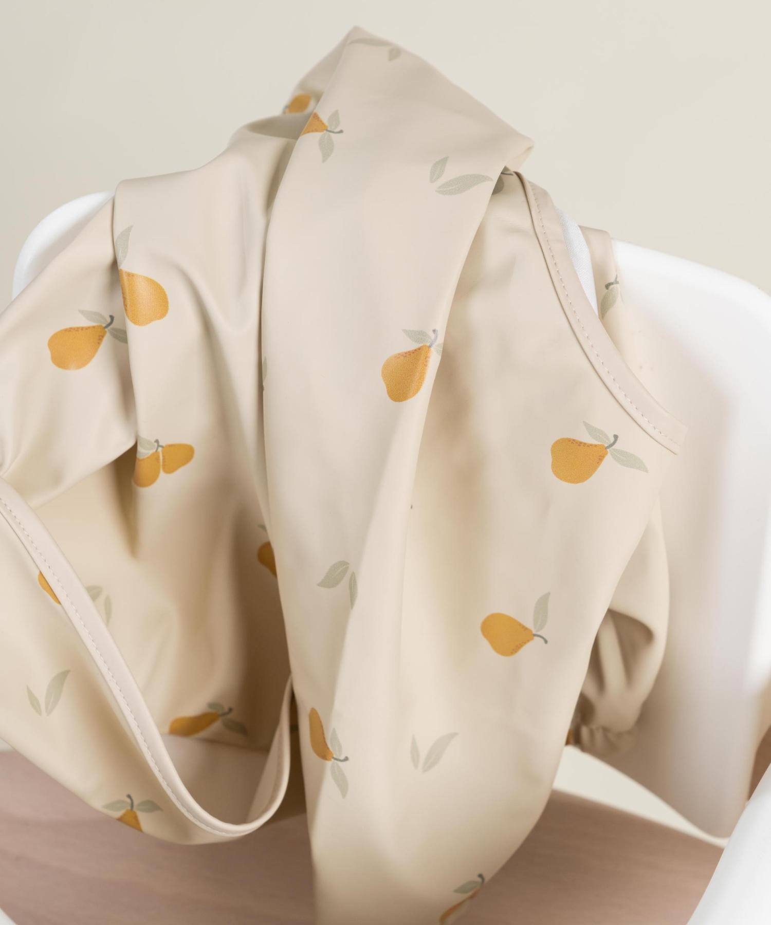 Haklapp med ärm & vattenavvisande ficka - Sunny pear Knatteplock