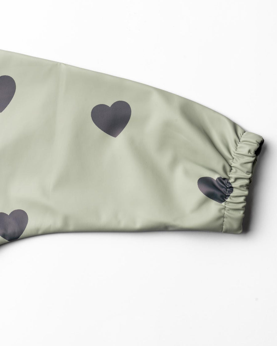 Haklapp med ärm & vattenavvisande ficka - Green hearts