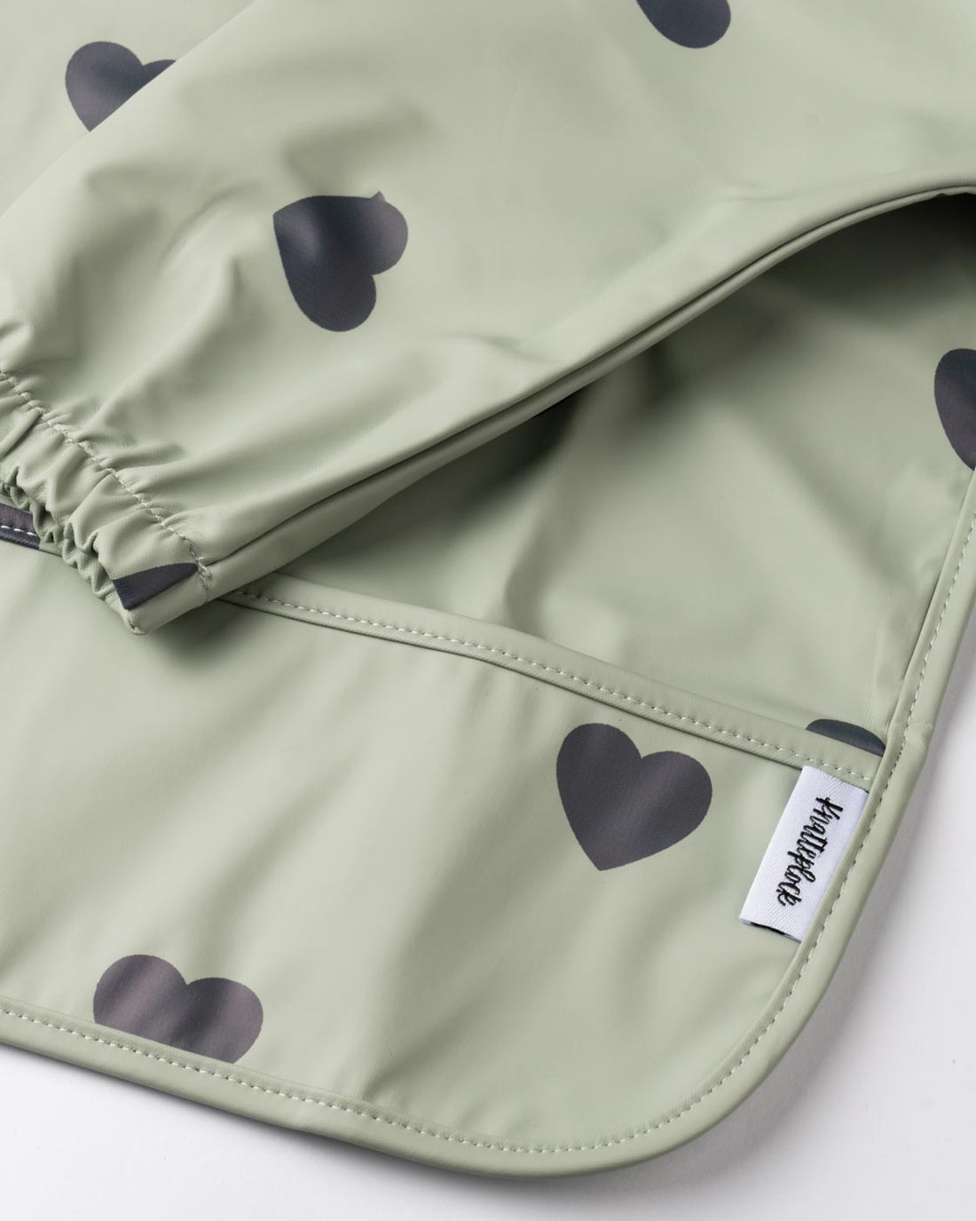 Haklapp med ärm & vattenavvisande ficka - Green hearts