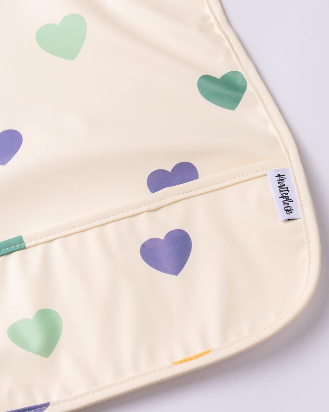 Haklapp utan ärm med vattenavvisande ficka - Color hearts