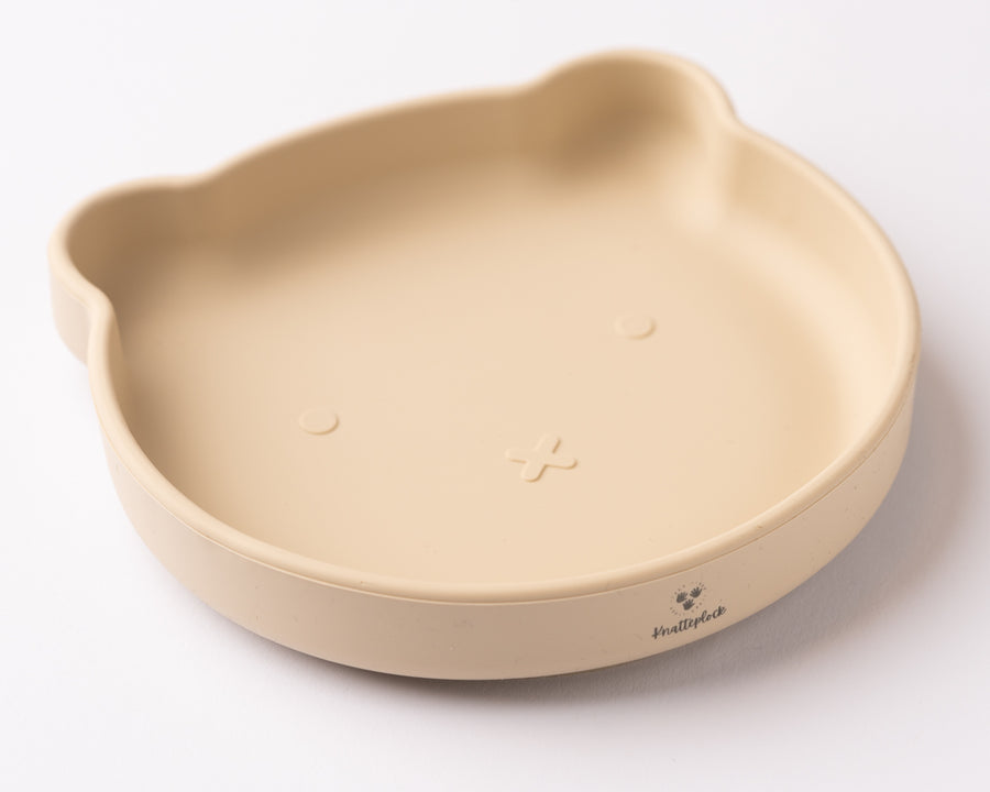 tallrik med sugpropp sand
